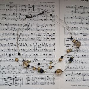 Elegant Gold and Black Beaded Necklace